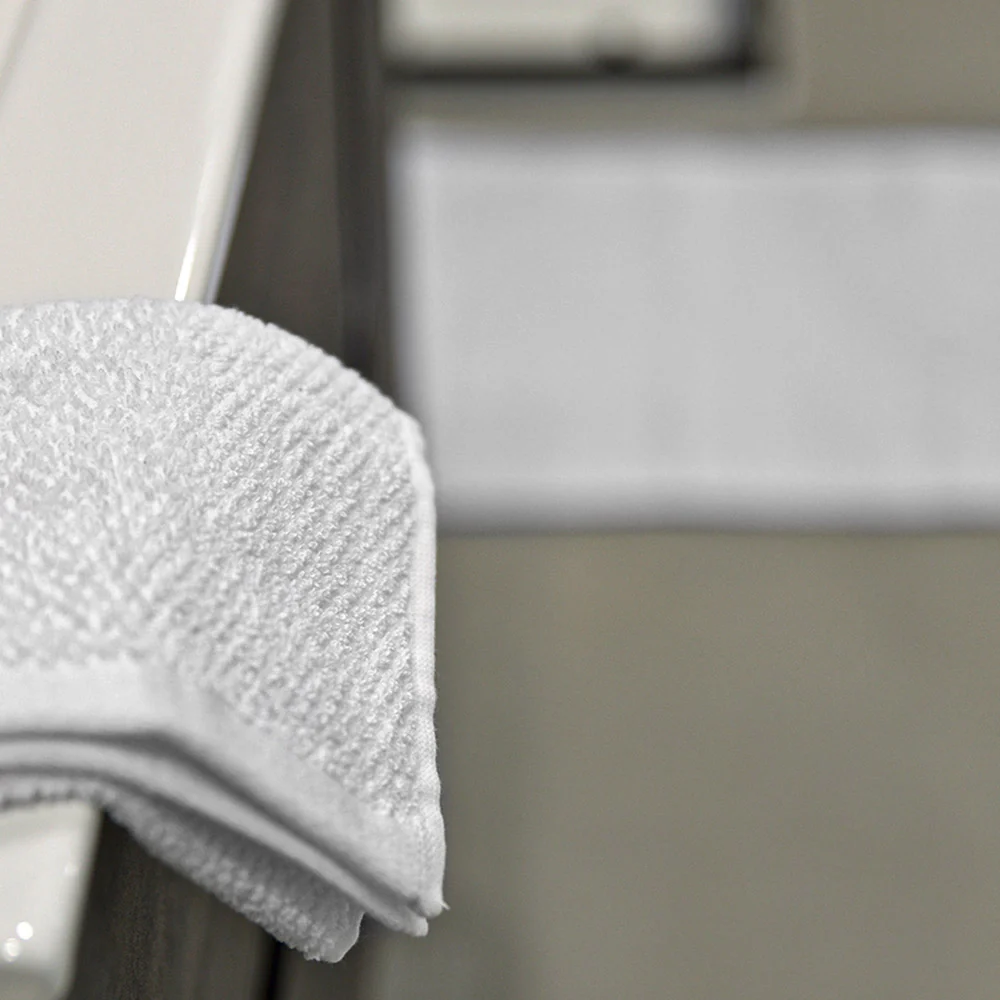 Asciugamani ospite per bagno 55x100 cm bianco in cotone 100% - Image 5